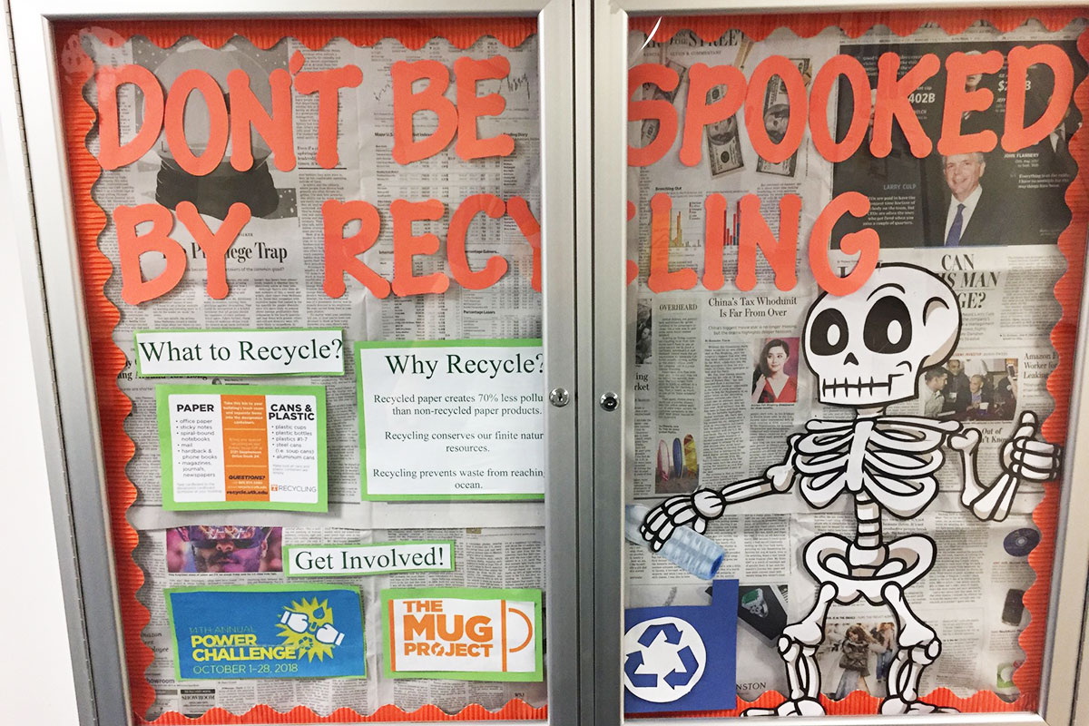 Morrill residence hall bulletin board featuring recycling information.