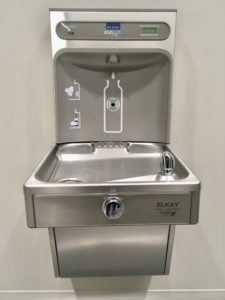 Photo of a water fountain with a bottle refill attachment on top